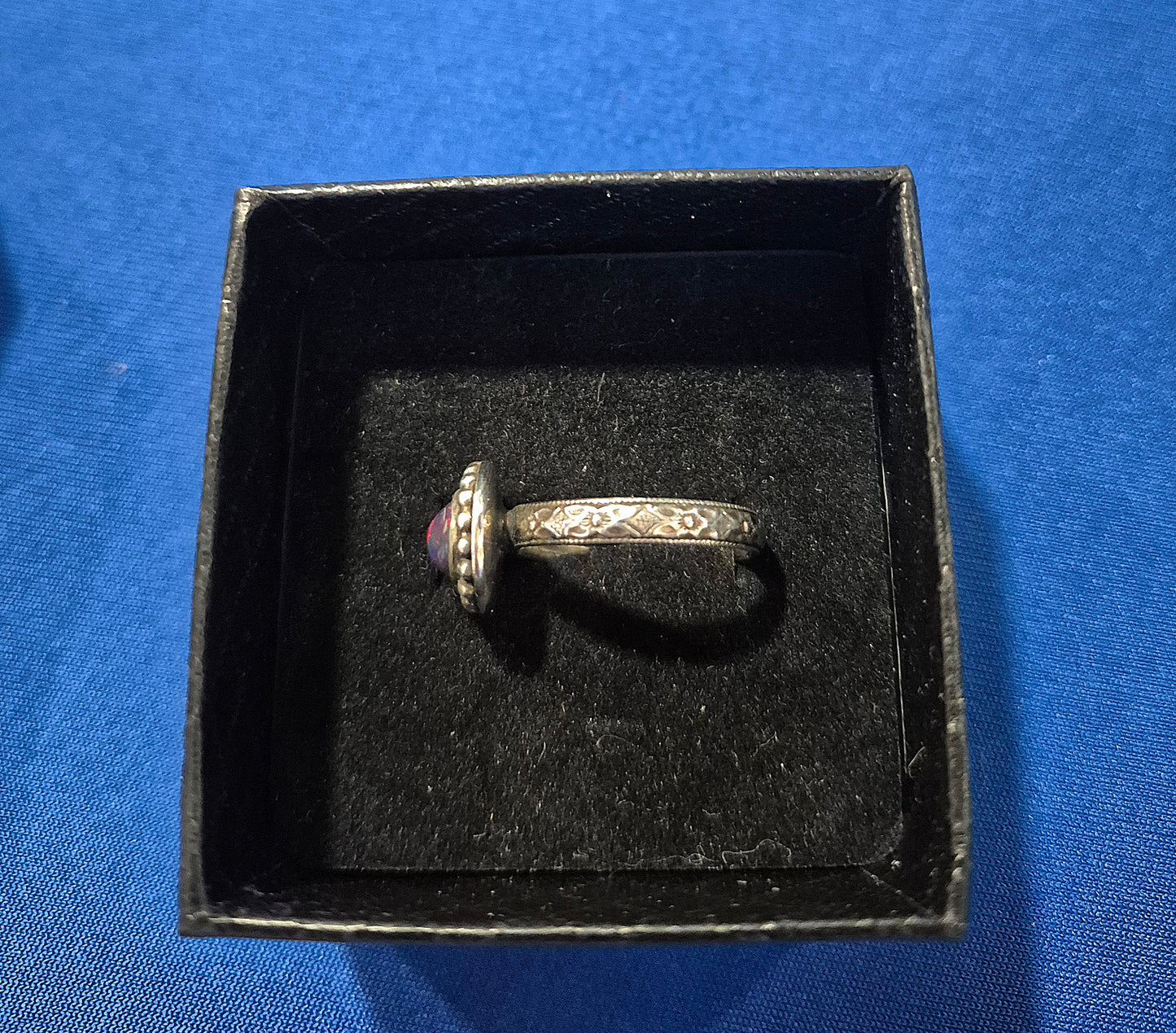 Ethiopian Opal ring with fancy band