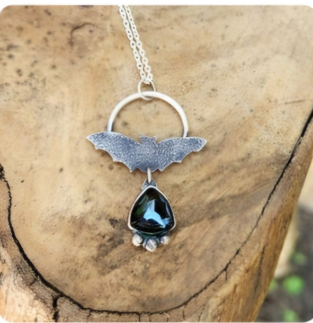 Sterling silver bat and hematite necklace