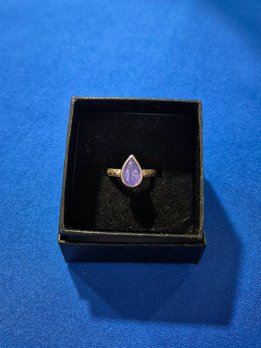 Sterling silver tanzanite ring with floral band