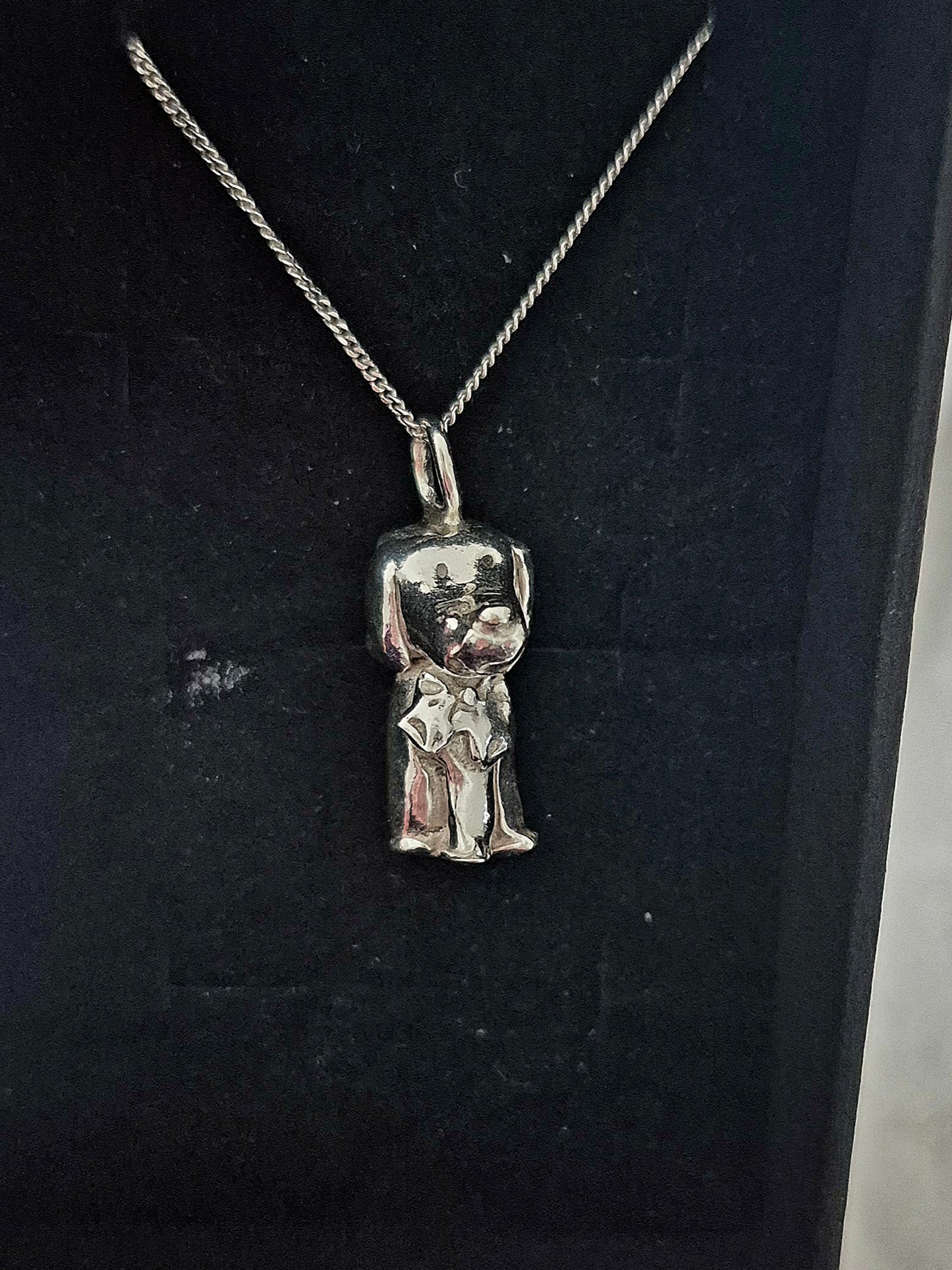 Handmade fine silver dog in bowtie necklace