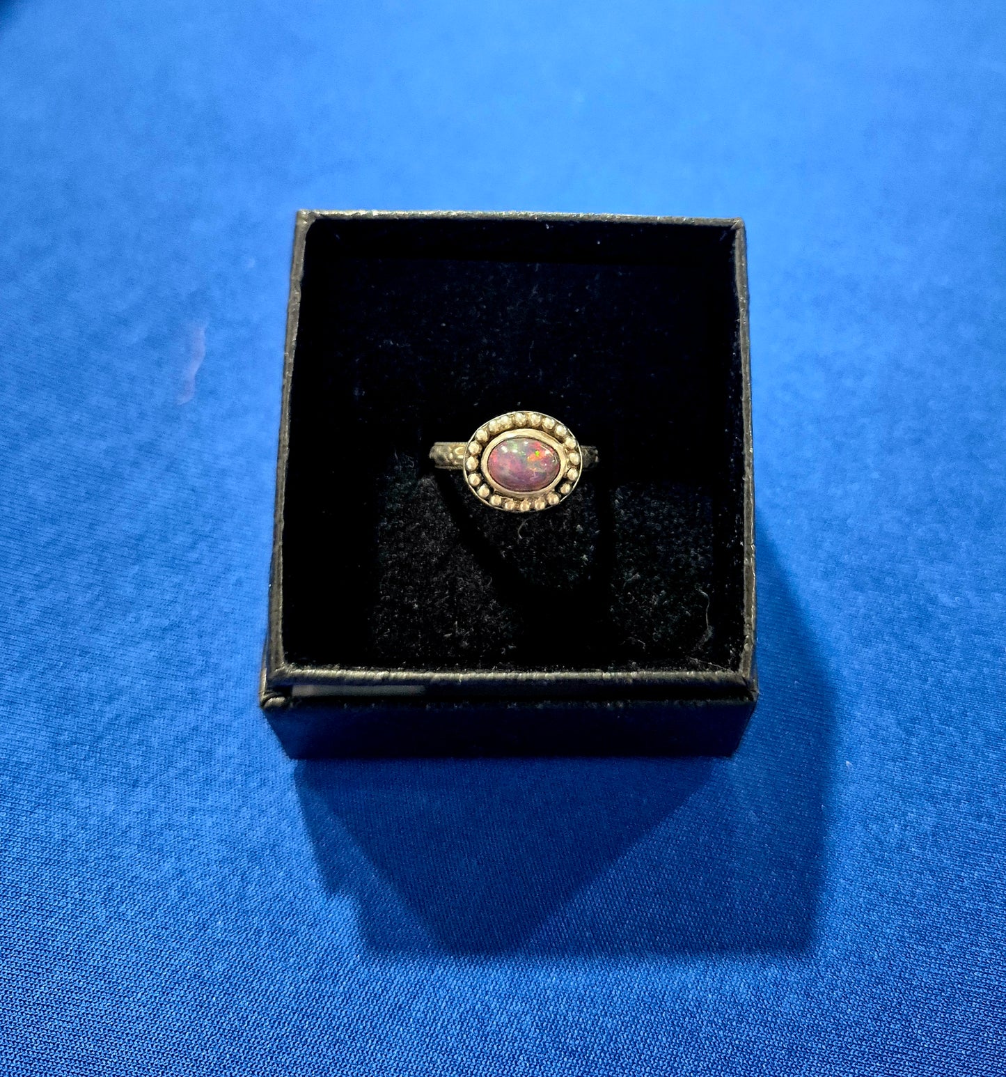 Ethiopian Opal ring with fancy band