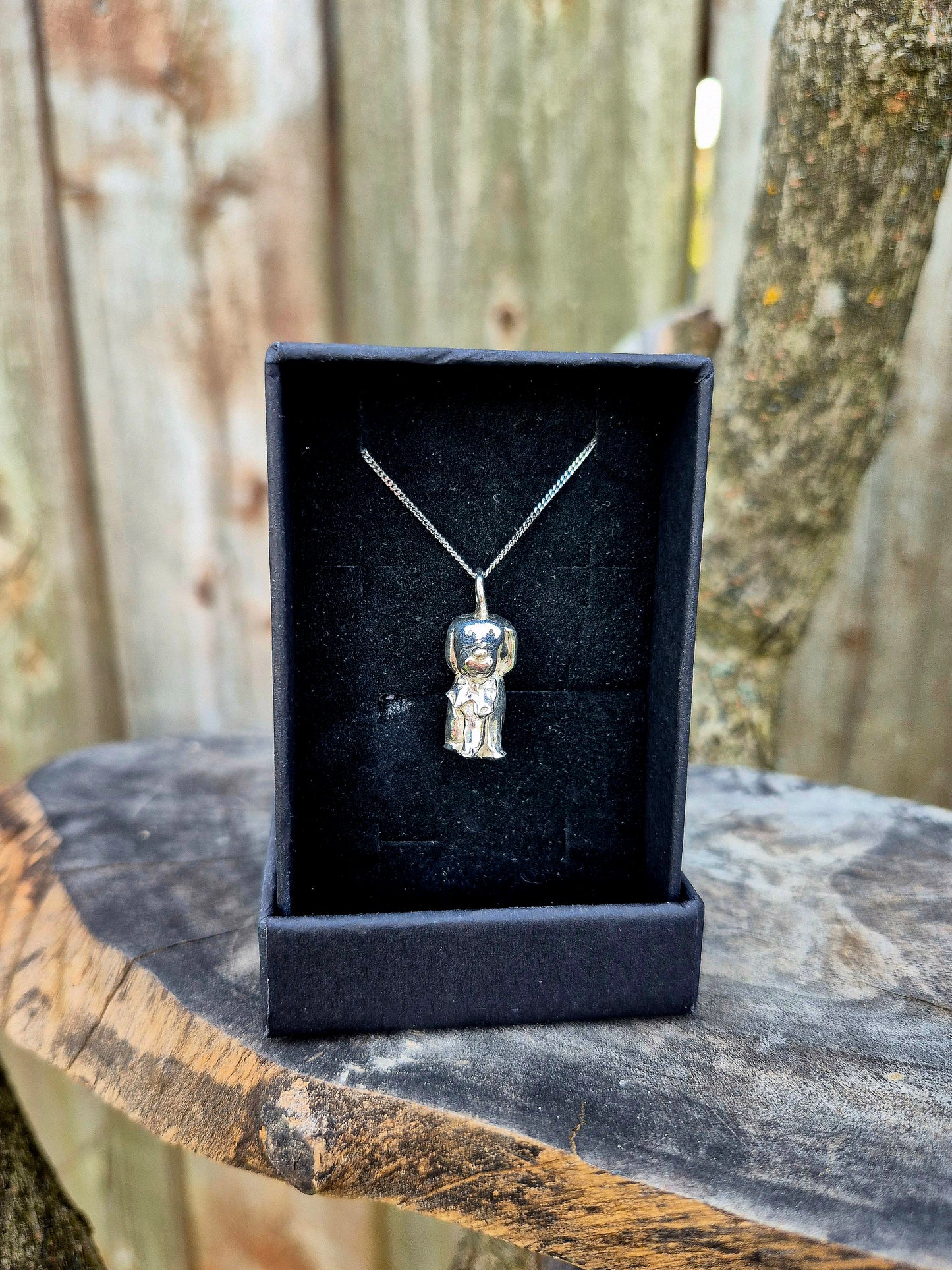 Handmade fine silver dog in bowtie necklace
