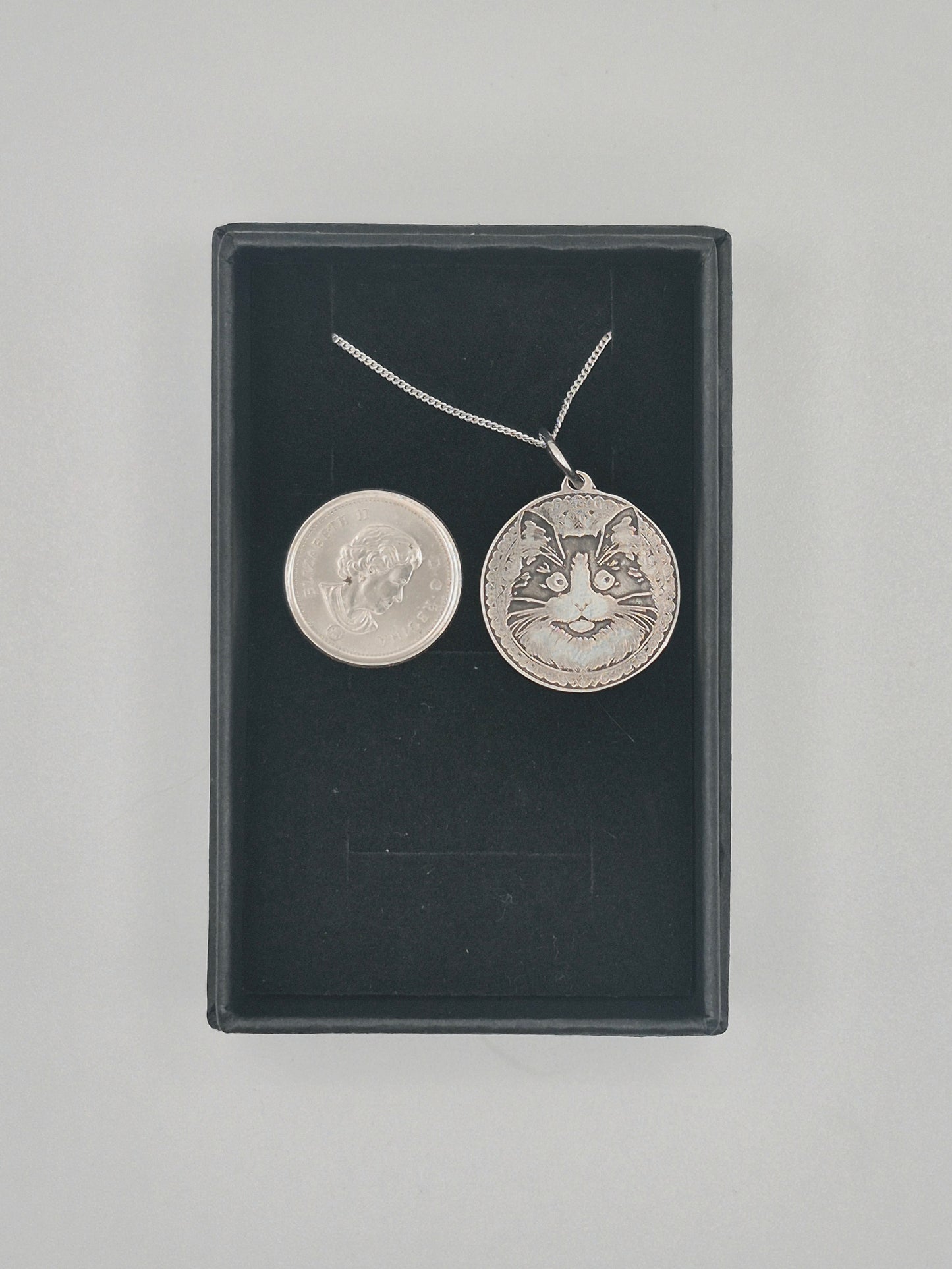 sterling silver fluffy cat coin
